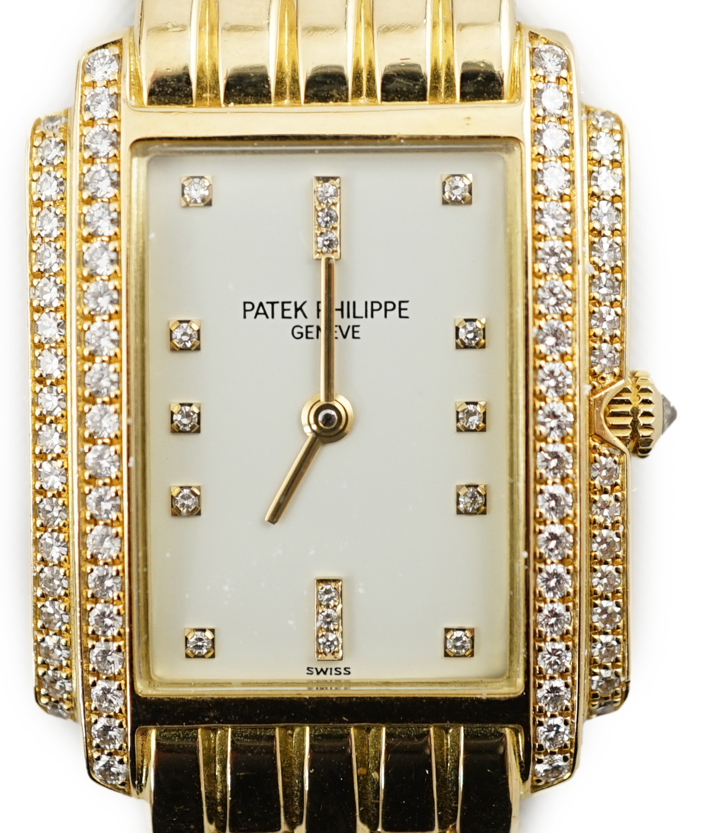 A lady's late 1990's 18ct gold and diamond set Patek Philippe Gondolo quartz wrist watch, on an 18ct gold Patek Philippe bracelet